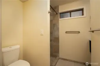 Tiled shower and floors.