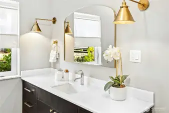 Thoughtful and high-end fixtures highlight the main floor bathroom.