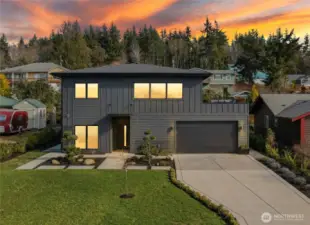 Custom built in 2023, this modern 3-bedroom view home with a roof-deck is a rare find in the Driftwood Key Neighborhood.
