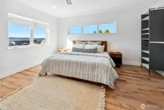 The third bedroom upstairs at the front of the house.