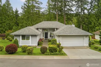 Pretty as a picture!  Home sits between golf course in back and Greenview Village's private park across the street.