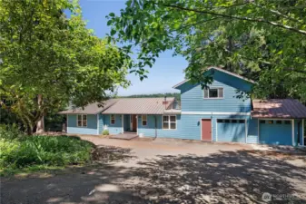 Front of home with circular driveway