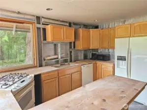 Sizable kitchen with a gas stove and dishwasher!