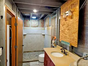 Bathroom is in with a composting toilet.