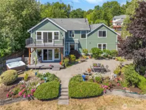 Huge patio for entertaining with fresh or salt water hot tub.