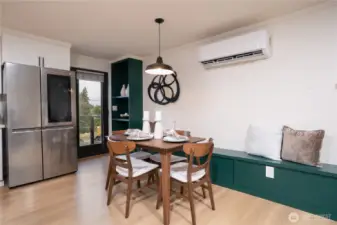 Custom dining area with built-in seating, storage, and power.