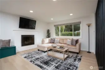 Open, spacious living room perfect for relaxing and entertaining guests.