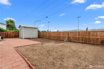 The backyard is ready for a new vision! Irrigation water available!