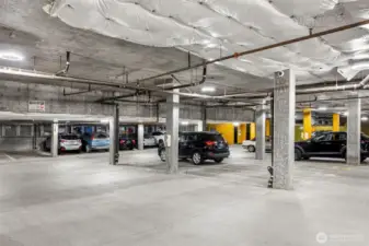 Large, airy common garage is easy to maneuver and well-lit.