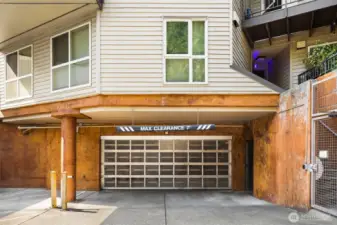 Secure garage entry off low-traffic back alley.