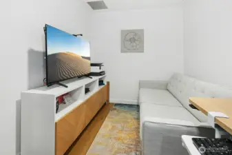 Another view of flexible den/workout space/office