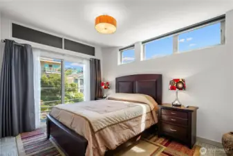 Private Primary en-suite w/ full size W/D, above the main living area