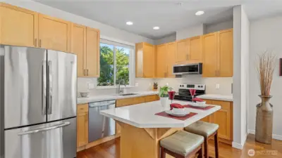 Large Kitchen with Eating Space, Newer Appliances and New Flooring!!