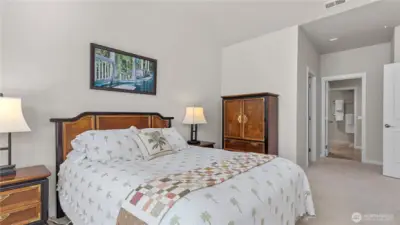 Primary Suite showing access to the Walk-In-Closet and Large 5-piece Bath.