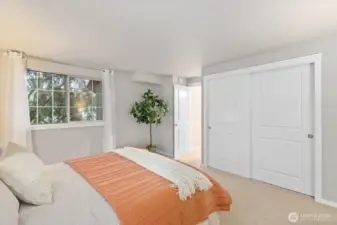 Primary Bedroom over looks the nature trail to downtown kirkland.