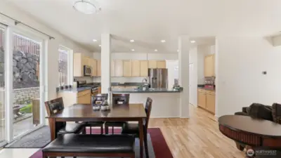 Perfect for hosting, with a seamless flow between dining, cooking, and gathering areas.