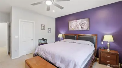 Designed for rest and relaxation, this primary suite feels both cozy and open.