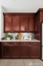 Loads of rich cabinetry,