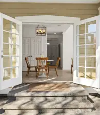 Eat-in Kitchen opens with french doors to patios
