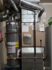 Natural Gas Water Heater and Forced Air Furnace with AIR CONDITIONING!