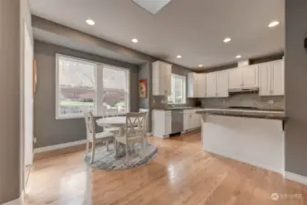 Gourmet kitchen delight with an eating bar that opens to additional dining and Great Room.