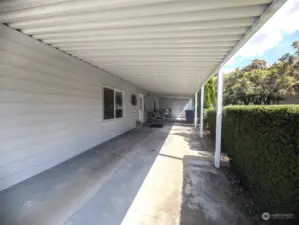 Extra-long carport with storage shed