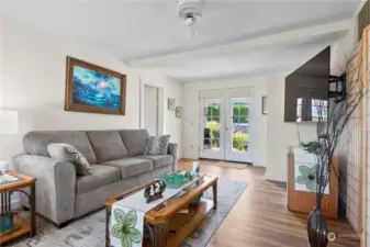 Living room w/French doors out onto the back deck