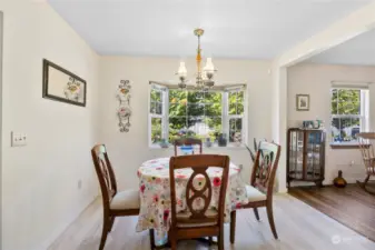 Dining room w/garden window opens to the kitchen & family room