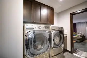 Large Laundry Room with pantry & utility sink.