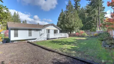 This space in the backyard is perfect for a play structure, garden, or a shed without taking away from your yard.