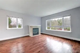 Light filled living room, large space for entertaining.