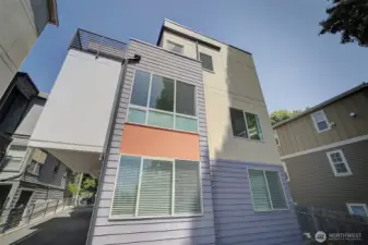 Southern Side with Driveway Access to Parking