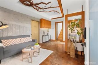The Dadu has two entry points. From the front door you enter in to the living room or office space or both! The door to the left is to an extra large storage room and Utility room.