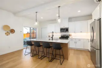 This is a dream kitchen w/a gas range, upgraded dishwasher and frigde.