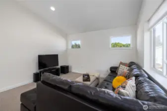 The bonus room is spacious with vaulted ceilings for added volume.