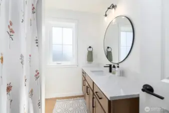 Light, bright and spacious upstairs bathroom.