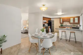 Dining room and kitchen located off living room.