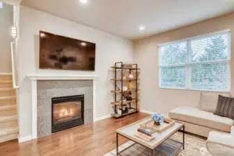 Spacious main living area with a cozy gas fireplace and open layout.