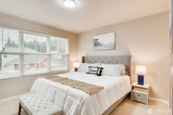 Primary suite on the third floor featuring ample space. Includes  an ensuite bath (not pictured).