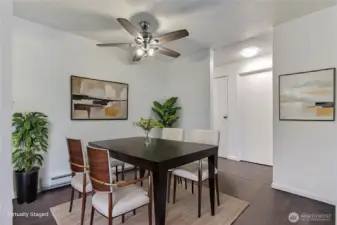 Dining area is just off the living room and right next to the kitchen. Virtually staged.