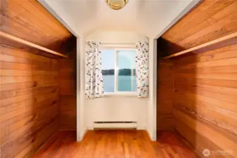 Spacious primary closet.