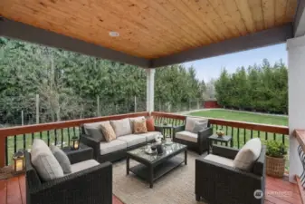 Relax on your covered back deck and enjoy your private paradise