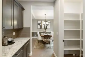 Butlery offers great serving space leading from the kitchen to the formal dining area.