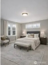 Main floor primary ensuite features attached 5 piece bath, large walk in closet and backyard views