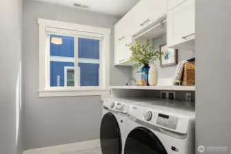 Laundry on bedroom level.