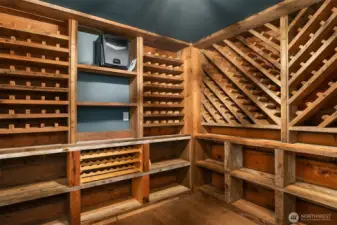 Wine cellar with reclaimed wood from original home.