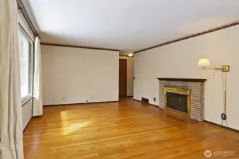 Spacious Living Room with gas fireplace.