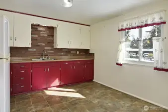 Kitchen with a breakfast nook.