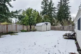 Large level yard. The South end of the property provides space for an RV or Boat.