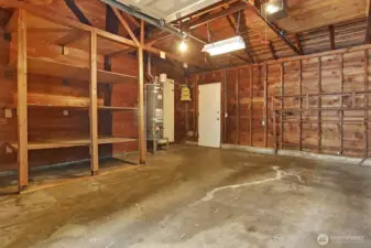 Attached garage with access to the utility room and kitchen. There is also a door to the rear yard.